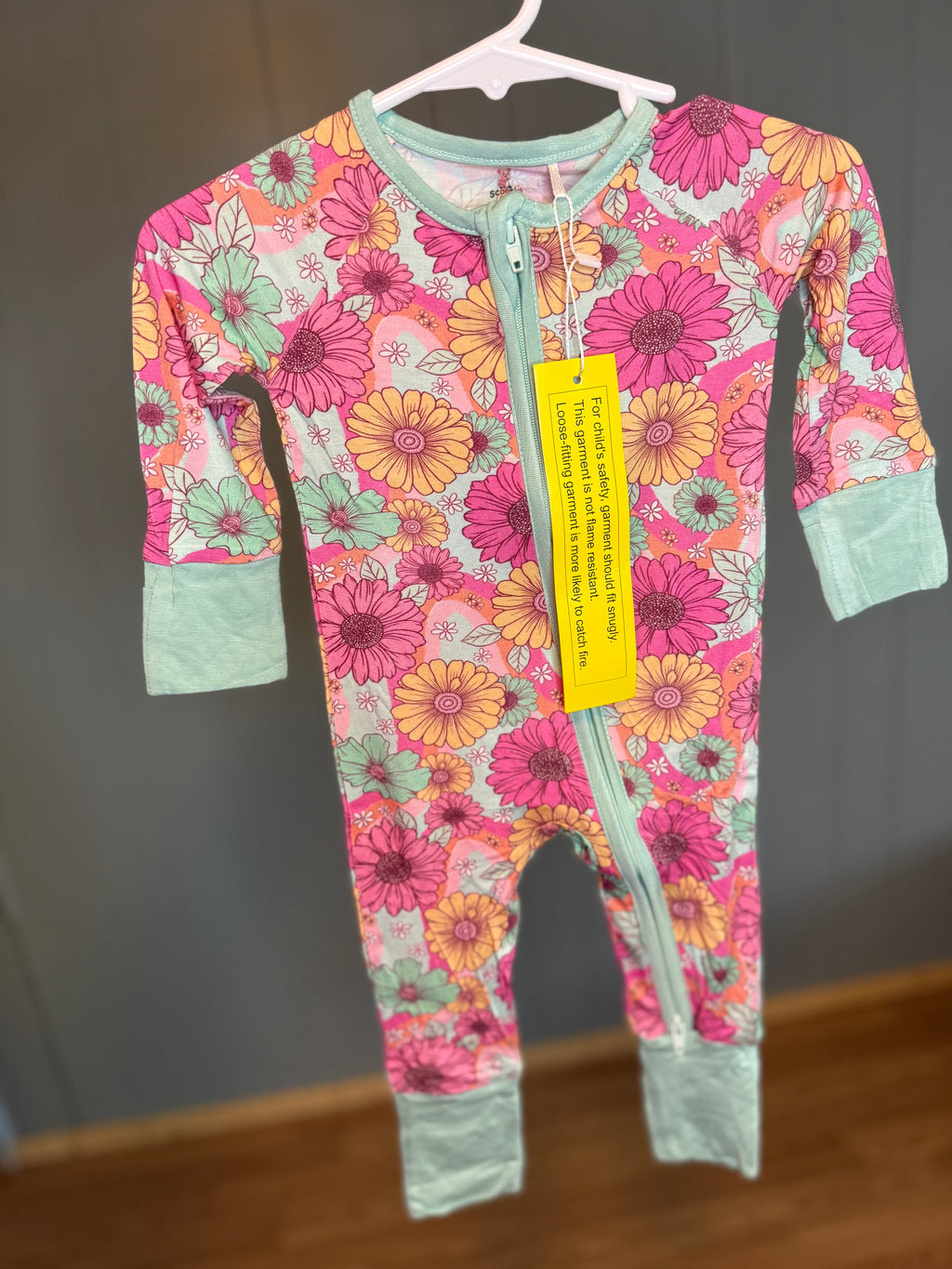 Flowers teal onesie