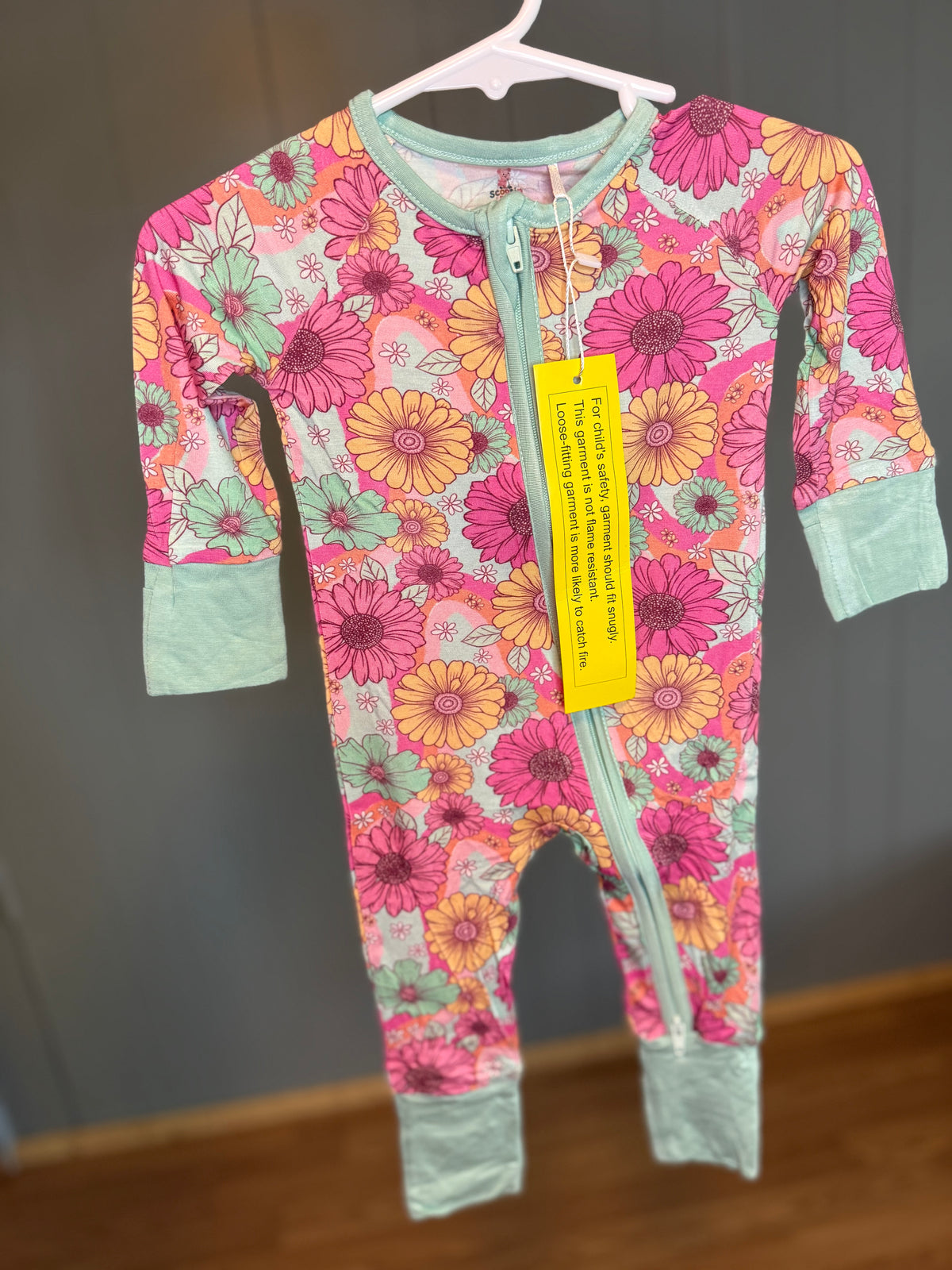 Flowers teal onesie