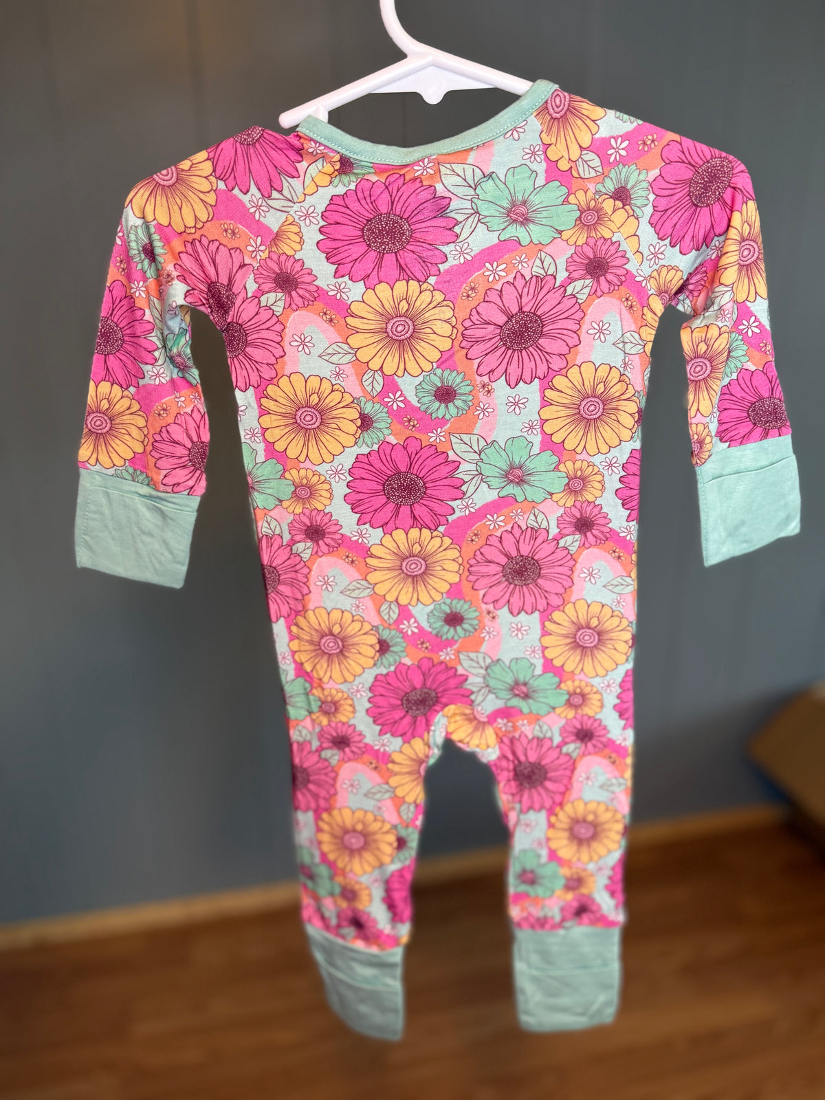 Flowers teal onesie